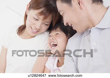 Parents and Young Daughter View Large Photo Image Stock Photo - Parents and Young Daughter. Fotosearch