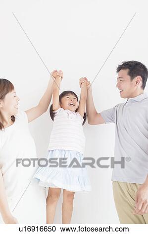 Parents Lifting Daughter From Hands View Large Photo Image Stock Image - Parents Lifting Daughter From Hands. Fotosearch