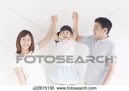 Parents Lifting Their Daughter Up From Hands View Large Photo Image Stock Image - Parents Lifting Their Daughter Up From Hands. Fotosearch