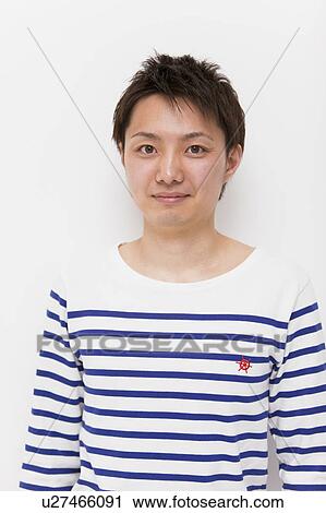 Stock Image - Portrait of a young man. Fotosearch