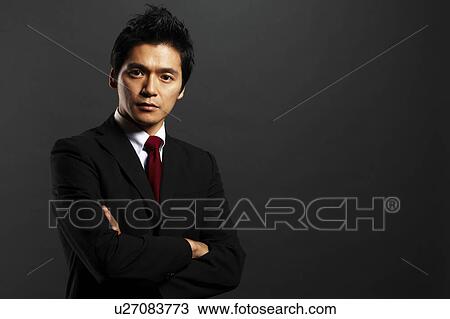 Stock Image - Portrait of Businessman. Fotosearch