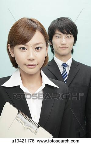 Stock Photograph - Portrait of Businesswoman and Businessman. Fotosearch