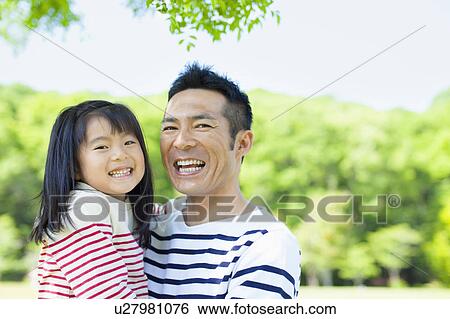 Portrait of father and daughter View Large Photo Image Stock Photograph - Portrait of father and daughter. Fotosearch