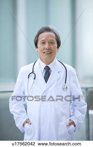 Stock Image - Portrait of Male Doctor. Fotosearch