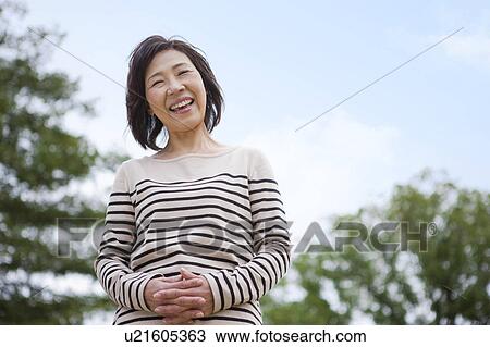 Portrait of mature woman View Large Photo Image Stock Image - Portrait of mature woman. Fotosearch