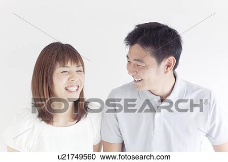 Stock Image - Portrait of Mid Adult Couple. Fotosearch