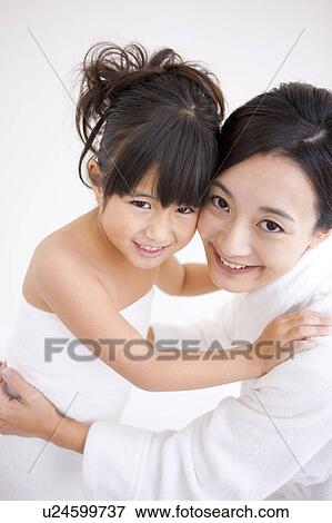 Portrait of mother and daughter View Large Photo Image Stock Photo - Portrait of mother and daughter . Fotosearch