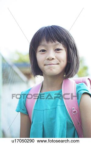 Stock Image - Portrait of Schoolgirl. Fotosearch
