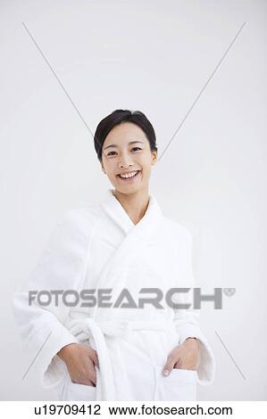 Portrait of woman in bathrobe View Large Photo Image Stock Image - Portrait of woman in bathrobe. Fotosearch