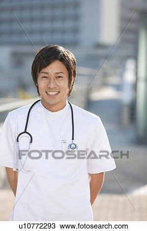 Portrait of Young Male Doctor View Large Photo Image Stock Image - Portrait of Young Male Doctor. Fotosearch