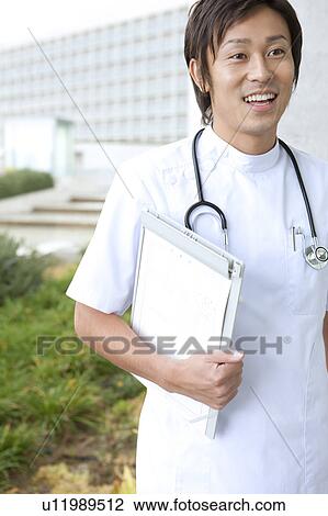 Portrait of Young Male Doctor View Large Photo Image Stock Image - Portrait of Young Male Doctor. Fotosearch