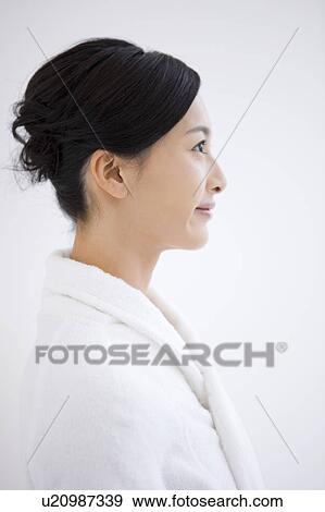 Stock Photo - Profile of woman in bathrobe. Fotosearch
