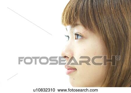 Stock Image - Profile of Young Woman. Fotosearch