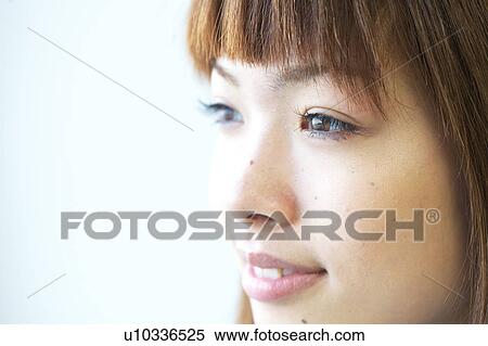 Stock Photography - Profile of Young Woman. Fotosearch
