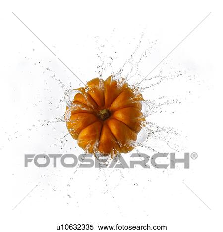 Stock Photography - Pumpkin Splashing Into Water. Fotosearch