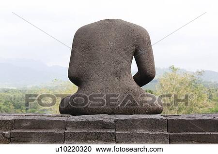 Rear view of Buddha at Borobudur Ruins, Java, Indonesia View Large Photo Image Stock Image - Rear view of Buddha at Borobudur Ruins, Java, Indonesia. Fotosearch