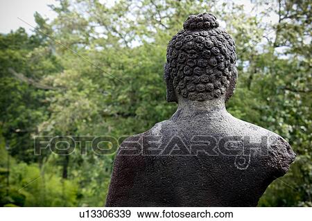 Rear view of Buddha at Borobudur Ruins, Java, Indonesia View Large Photo Image Stock Photo - Rear view of Buddha at Borobudur Ruins, Java, Indonesia. Fotosearch