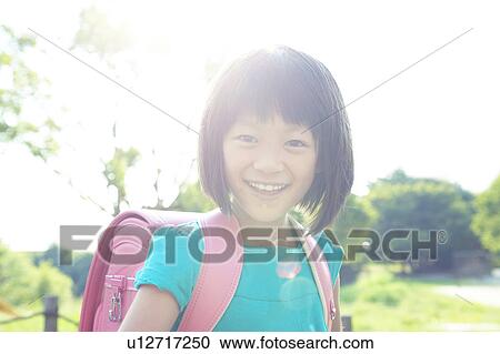 Schoolgirl in Bright Sunlight View Large Photo Image Stock Image - Schoolgirl in Bright Sunlight. Fotosearch