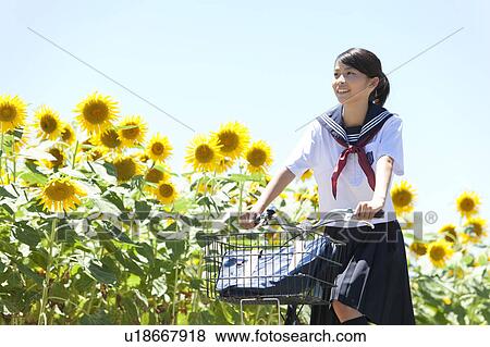 Schoolgirl with Bicycle View Large Photo Image Stock Photo - Schoolgirl with Bicycle. Fotosearch