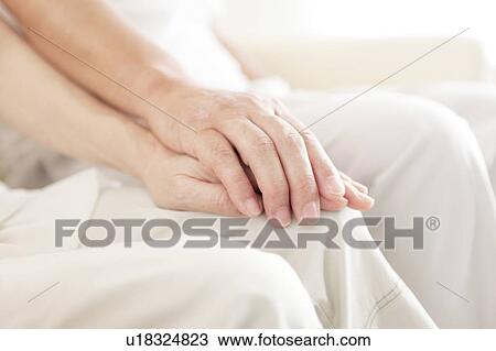 Senior Couple Holding Hands View Large Photo Image Stock Image - Senior Couple Holding Hands. Fotosearch