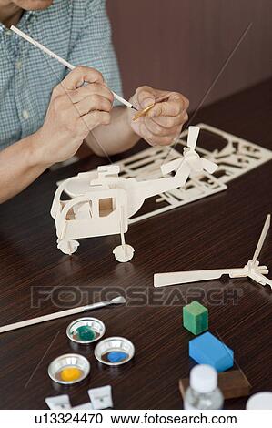 Senior Man Painting Wooden Toy View Large Photo Image Stock Image - Senior Man Painting Wooden Toy. Fotosearch