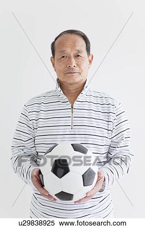 Senior Man with Soccer Ball View Large Photo Image Stock Photography - Senior Man with Soccer Ball. Fotosearch