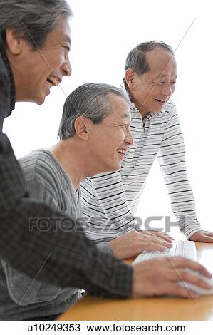 Senior Three Men at Computer View Large Photo Image Stock Image - Senior Three Men at Computer. Fotosearch