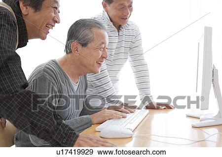 Senior Three Men at Computer View Large Photo Image Stock Photo - Senior Three Men at Computer. Fotosearch