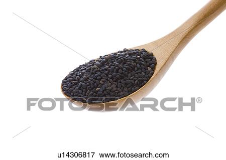 Stock Photo - Sesame Seeds in Wooden Spoon. Fotosearch