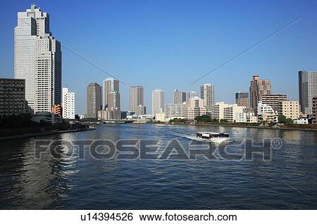 Stock Photograph - Skyline and Sumida River, Tokyo, Honshu, Japan. Fotosearch
