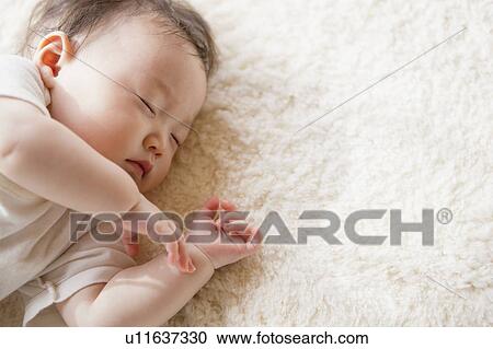 Sleeping baby View Large Photo Image Stock Image - Sleeping baby. Fotosearch