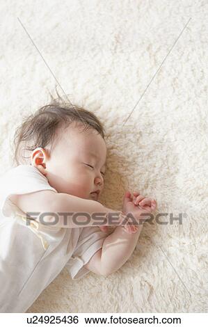Stock Photograph - Sleeping baby. Fotosearch