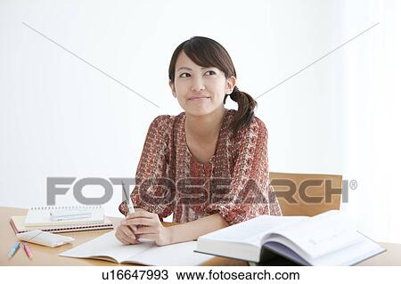 Student Thinking at Desk View Large Photo Image Stock Image - Student Thinking at Desk. Fotosearch