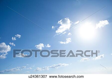 Stock Photo - Sun and Clouds. Fotosearch