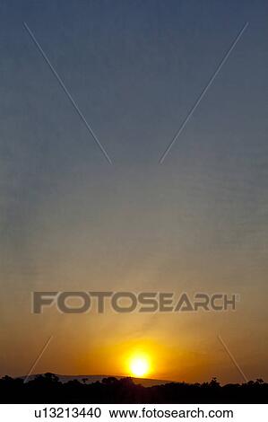 Stock Image - Sunrise Over Savannah. Fotosearch
