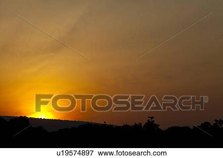 Stock Photo - Sunrise Over Savannah. Fotosearch