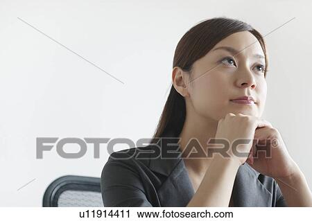 Thoughtful Businesswoman View Large Photo Image Stock Image - Thoughtful Businesswoman. Fotosearch