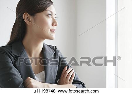 Thoughtful Businesswoman View Large Photo Image Stock Photo - Thoughtful Businesswoman. Fotosearch