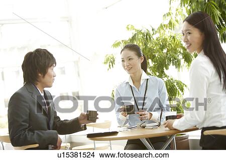 Three Businesspeople Having Meeting View Large Photo Image Picture - Three Businesspeople Having Meeting. Fotosearch
