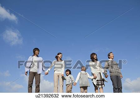 Three Generation Family and Blue Sky View Large Photo Image Stock Image - Three Generation Family and Blue Sky. Fotosearch