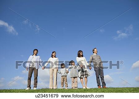 Stock Photo - Three Generation Family in Field. Fotosearch