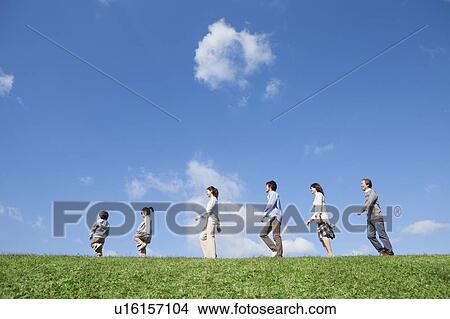 Three Generation Family Walking in Field View Large Photo Image Picture - Three Generation Family Walking in Field. Fotosearch
