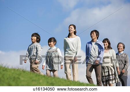 Three Generation Family Walking in Field View Large Photo Image Stock Image - Three Generation Family Walking in Field. Fotosearch