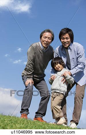 Stock Photography - Three Generations of Males. Fotosearch
