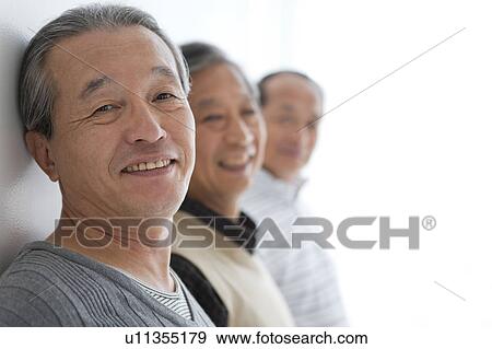 Three Senior Leaning Against Wall View Large Photo Image Stock Photo - Three Senior Leaning Against Wall. Fotosearch