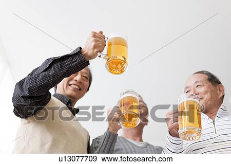 Three Senior Men Having Beer View Large Photo Image Stock Photo - Three Senior Men Having Beer. Fotosearch