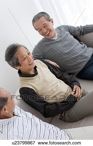 Stock Photo - Three Senior Men on Sofa. Fotosearch