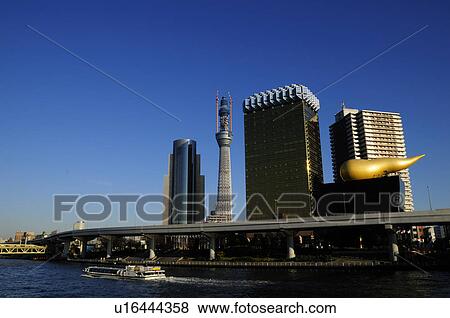 Stock Photo - Tokyo Skytree Tower and Asahi Beer Hall. Fotosearch