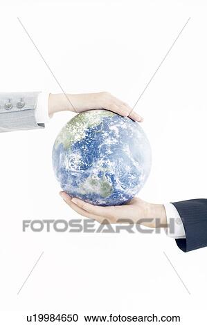 Two People Holding The Earth Between Their Hands View Large Photo Image Stock Image - Two People Holding The Earth Between Their Hands. Fotosearch