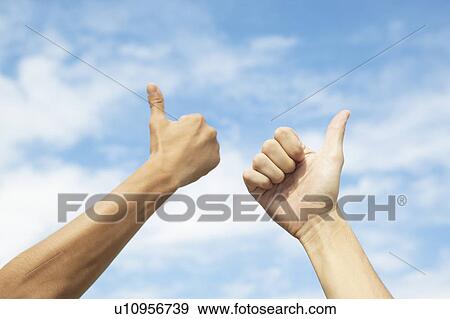 Stock Photo - Two People with Thumbs Up. Fotosearch